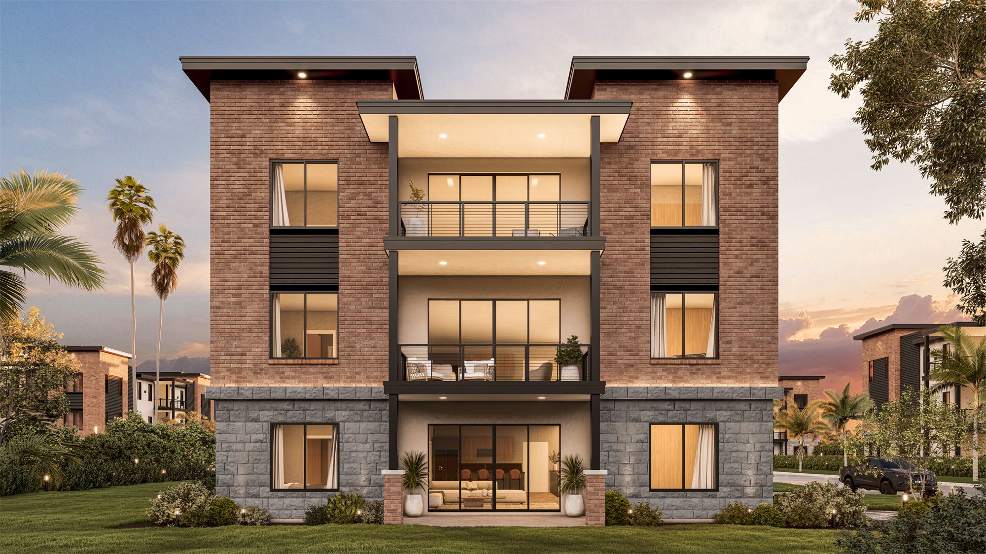 Carmel apartment building end elevation with stacked balconies framed in brick