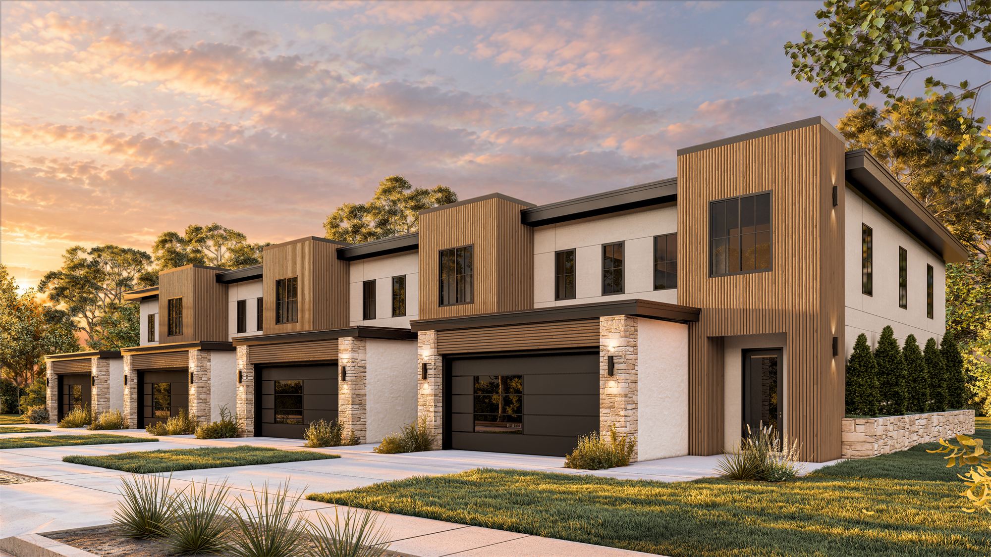 Four-unit townhouse building in Davenport with wood cladding, stone, and two-car garages