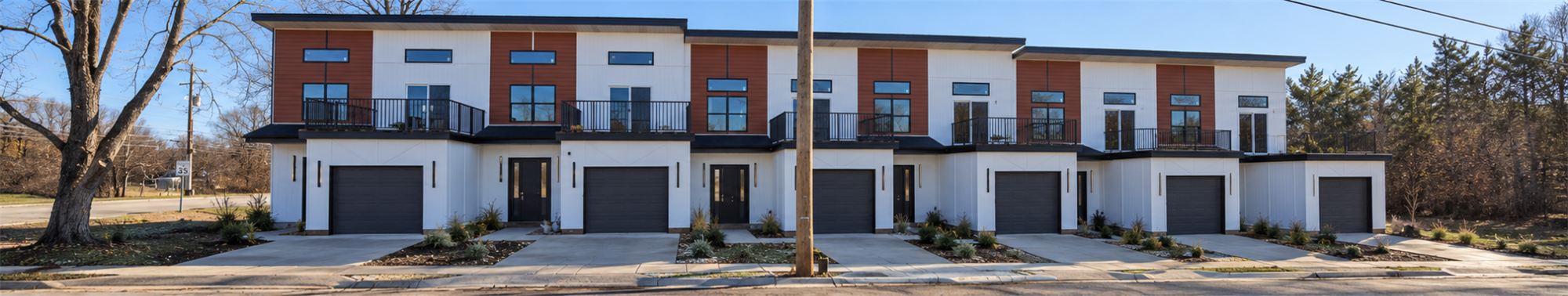 Indiana Townhomes: six attached townhouse units along the street in Jeffersonville, Indiana