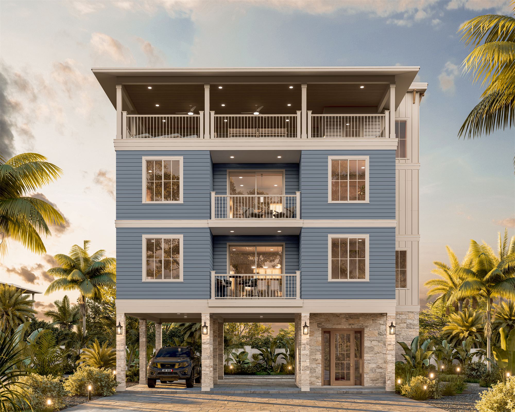 Elevated coastal duplex in Treasure Island with blue siding and a covered rooftop lounge